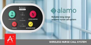 Nurse using wireless nursing call system in hospital setting